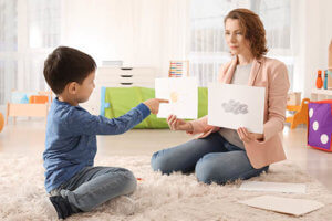 detect early signs of autism through early intervention services